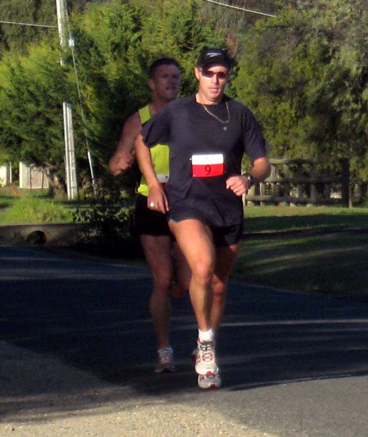 John Mackenzie racing with bib number 9