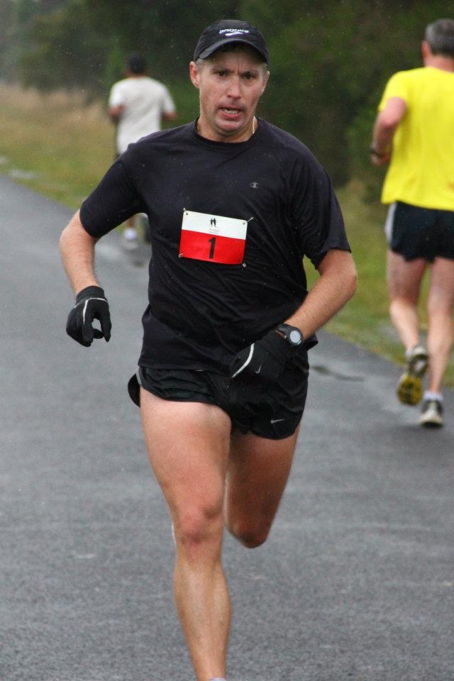 John Mackenzie racing with bib number 1