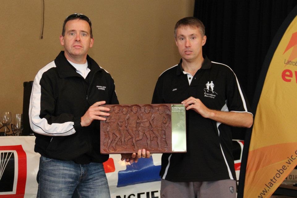 John Mackenzie receiving a Traralgon Harriers marathon plaque